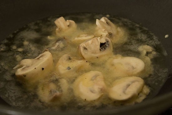 shallow frying mushrooms to make dry mushroom manchurian recipe.