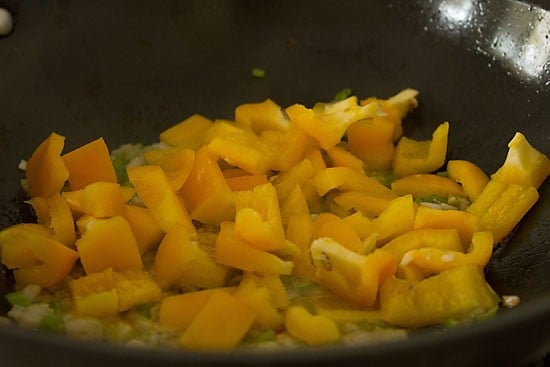 bell peppers added to the pan.