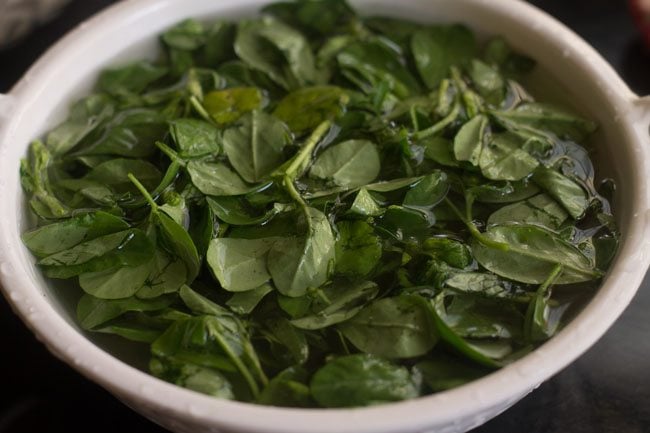 soaking methi leaves for a second time.