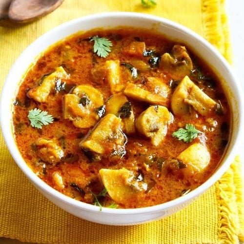 methi mushroom in a white bowl on a yellow napkin