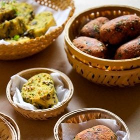 steamed and fried methi muthiya served in bowls.