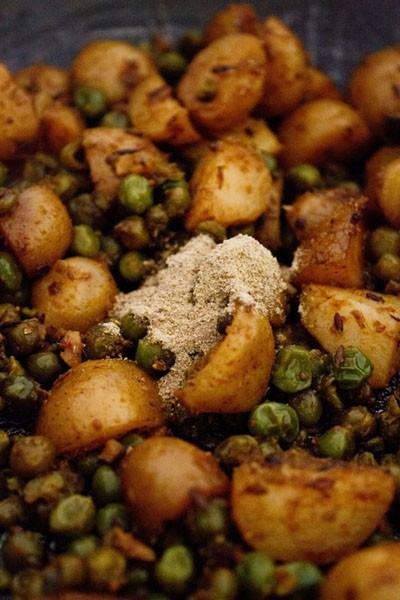 dry-aloo-matar8 add masala to dry aloo matar