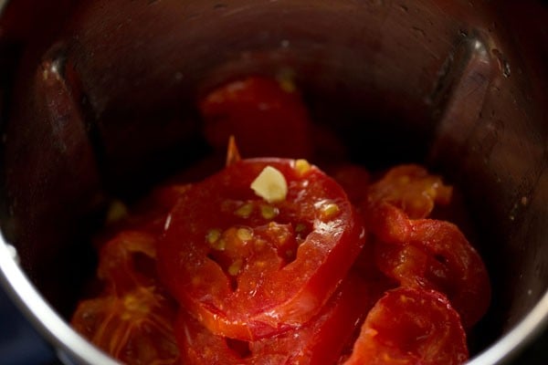 roasted garlic & tomatoes, and remaining juices added to blender jar.