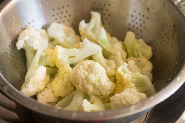 drained cauliflower florets for aloo gobi matar