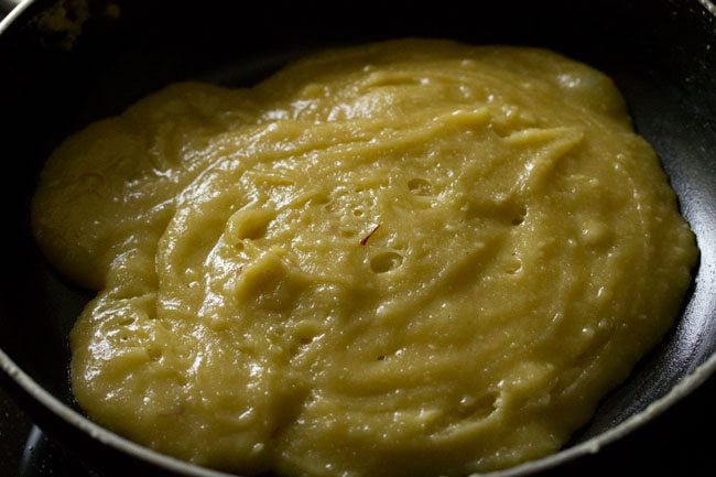 stir and cooking almond halwa