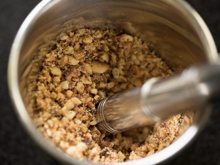 crushing peanuts to a coarse powder