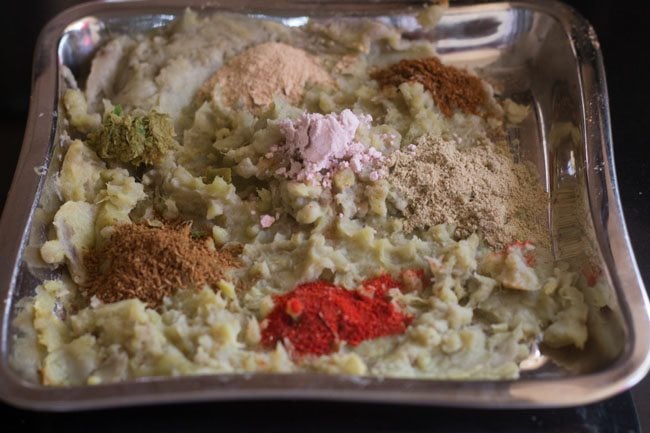 spice powders and rock salt added to the mashed sweet potatoes. 