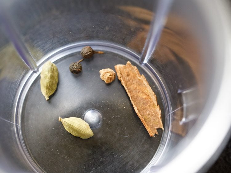 whole spices in a grinder 