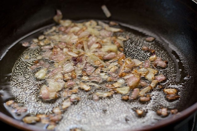 lightly browned onions in a pan.