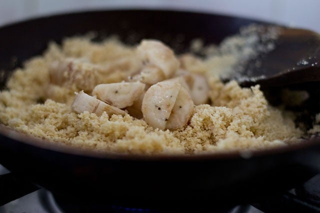 Add chopped bananas to semolina in pan.