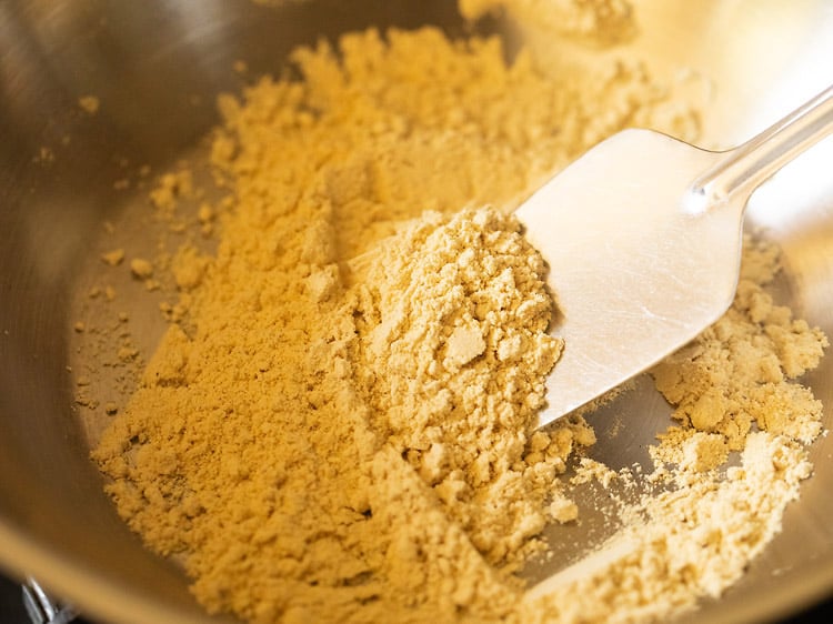 roasting gram flour in a pan