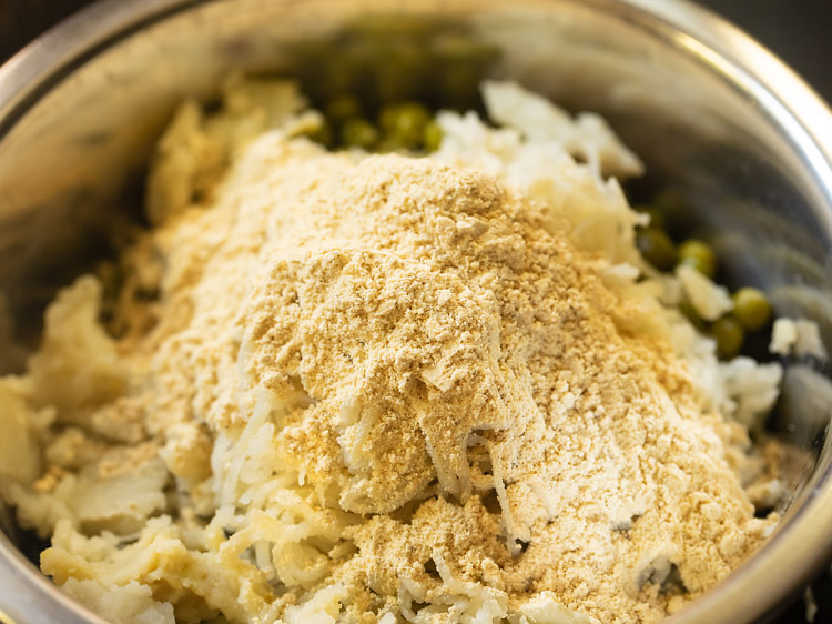 gram flour added to veggie mixture in the bowl