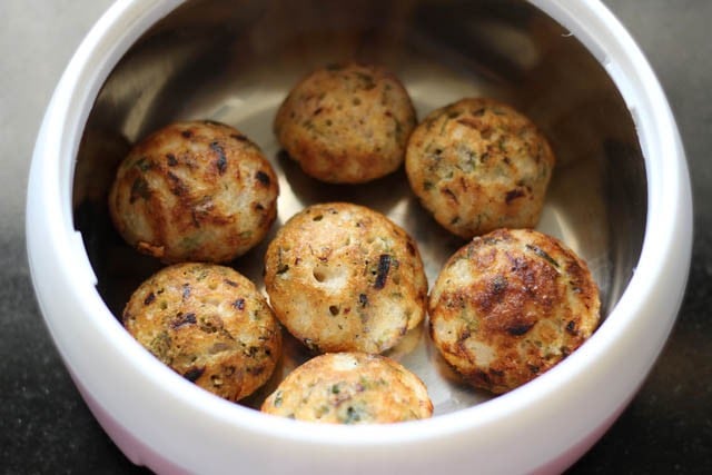 cooked paniyaram in a casserole