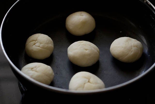 dough balls in the pan