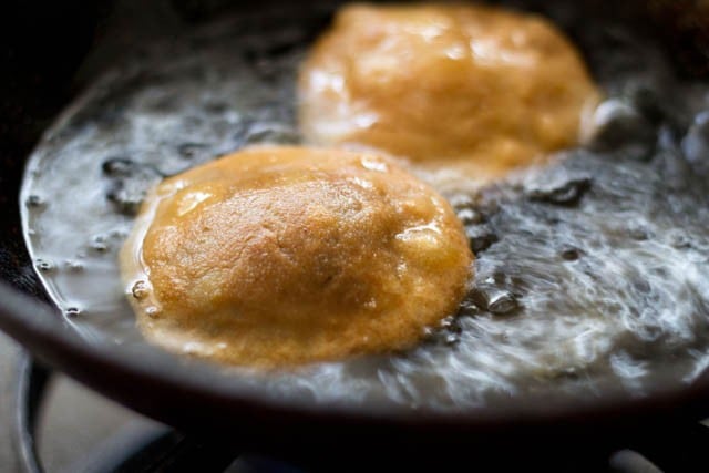 frying second side of matar kachori 