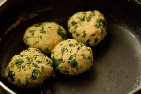 four medium-sized dough balls for methi paratha 