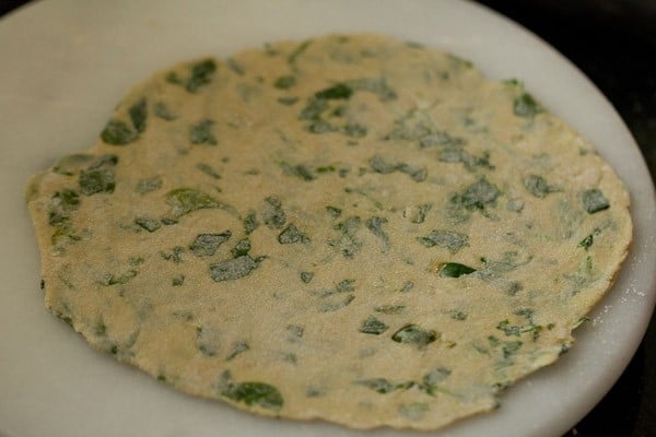 rolled methi paratha dough into a medium-size