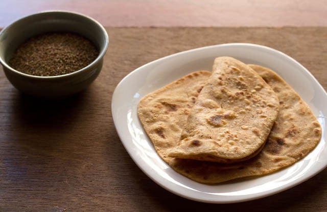 ajwain paratha served on a white plate