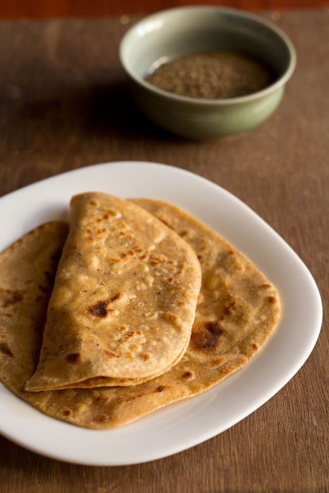 ajwain paratha served on a white plate