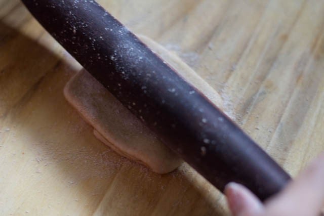 start rolling the paratha with a rolling pin