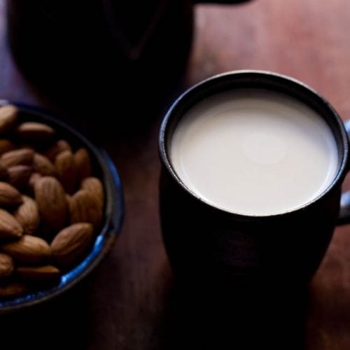 almond milk in a ceramic mug.