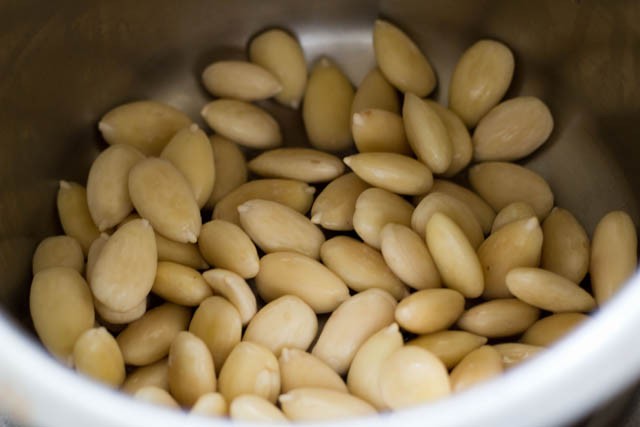 drained water from blanched almonds.