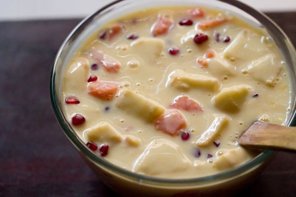 stirring fruit custard together