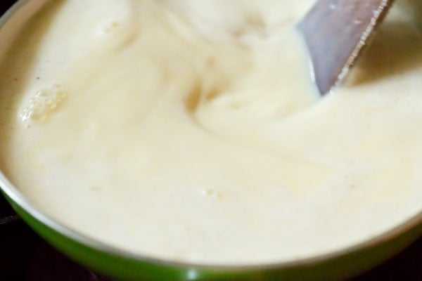 stirring vigorously to prevent lumps in custard 