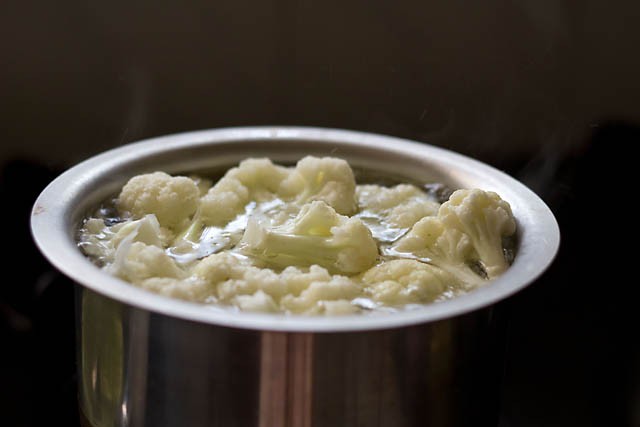 boiling cauliflower florets in salted water