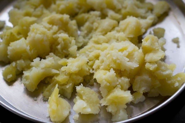 peeled and mashed boiled potatoes.