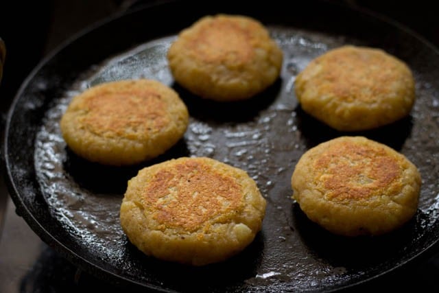 pan fried aloo tikki still on the tava.