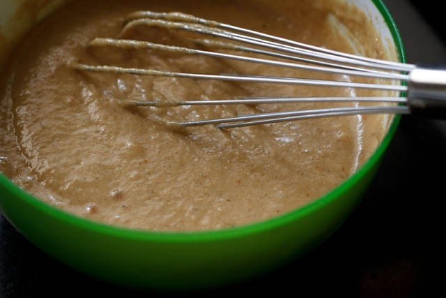 mixing water and oil to dry ingredients in bowl