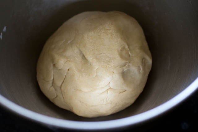 rubbing oil on prepared brown bread dough, keeping for leavening 