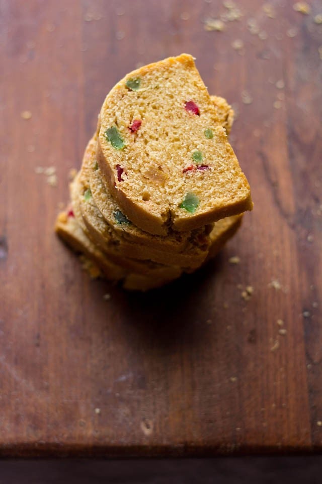 fruit bread slices on a wooden board.