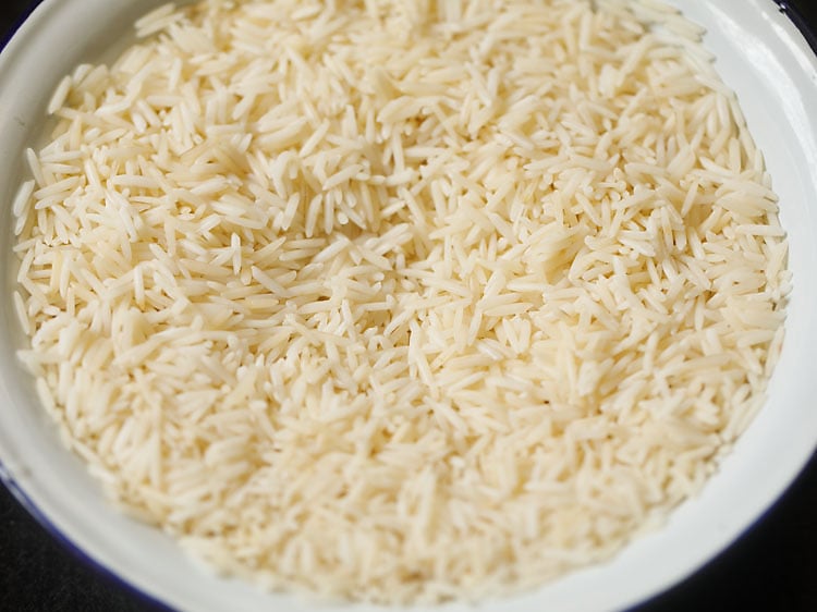 rice grains after being soaked for 30 minutes and drained.