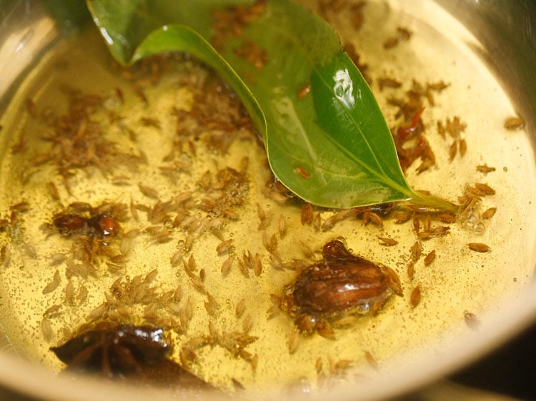 frying spices in ghee.