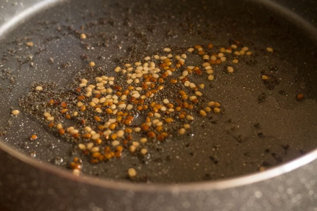 frying urad dal till golden