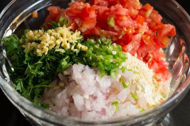 ginger, green chillies and cilantro in mixing bowl