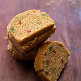 fruit bread slices on a wooden board.