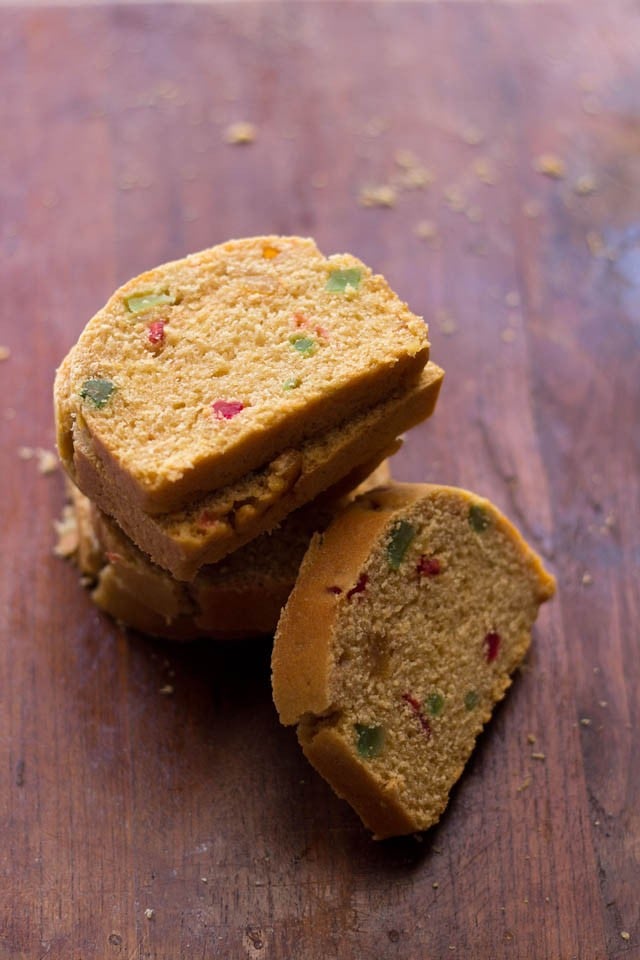 fruit bread slices on a wooden board.