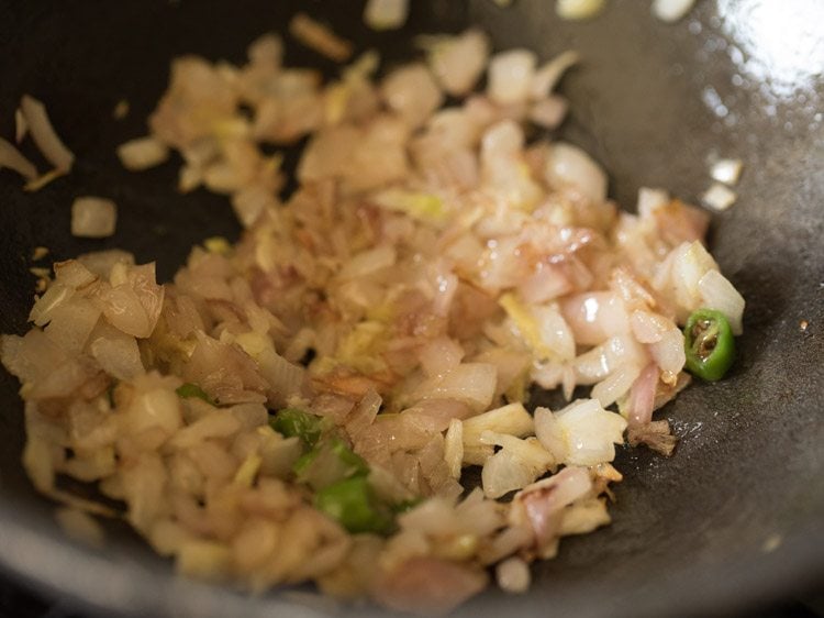 sautéing ginger garlic paste for making bhindi masala recipe. 