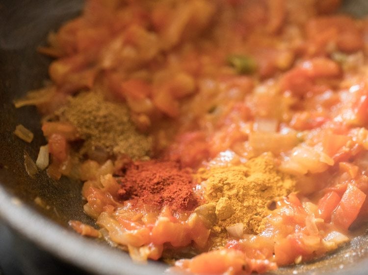 spice powders added to tomatoes. 