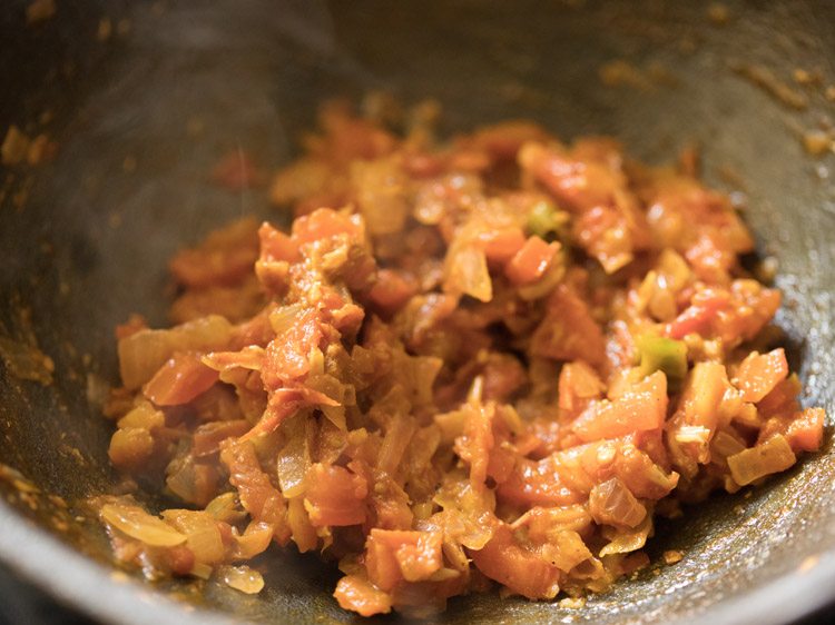 sautéing spiced tomatoes. 