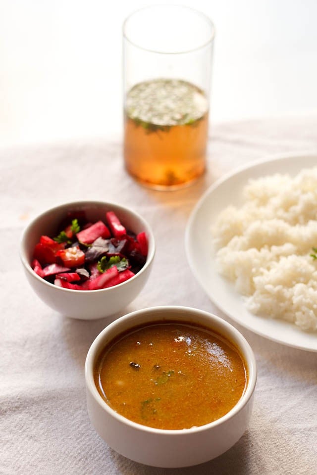 chawli usal served in a bowl, with steamed rice and salad.