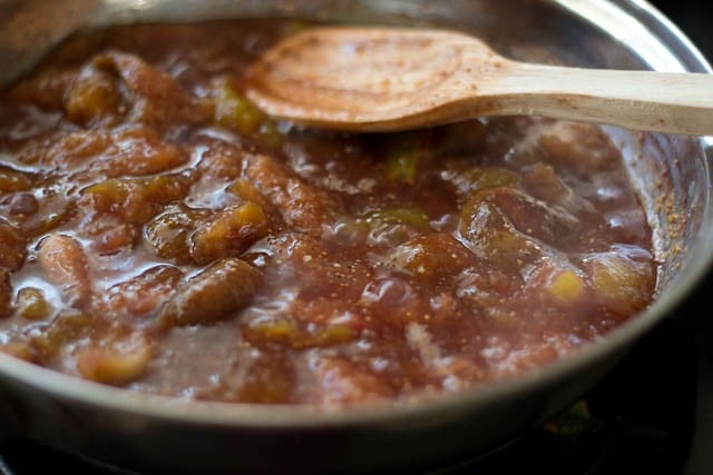 stirring and cooking fig mixture in pan