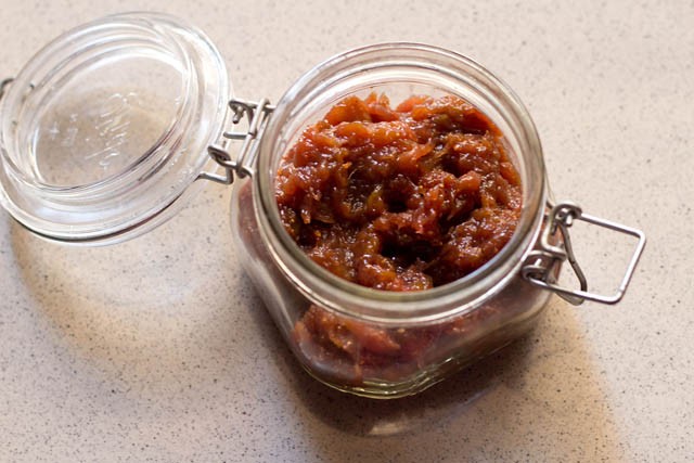 filling cooled fig jam in glass jar and refrigerating it