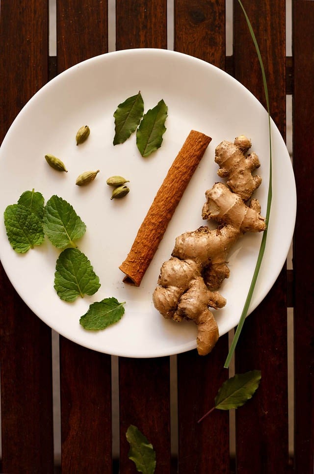 herbs and spices kept on a plate for herbal tea 