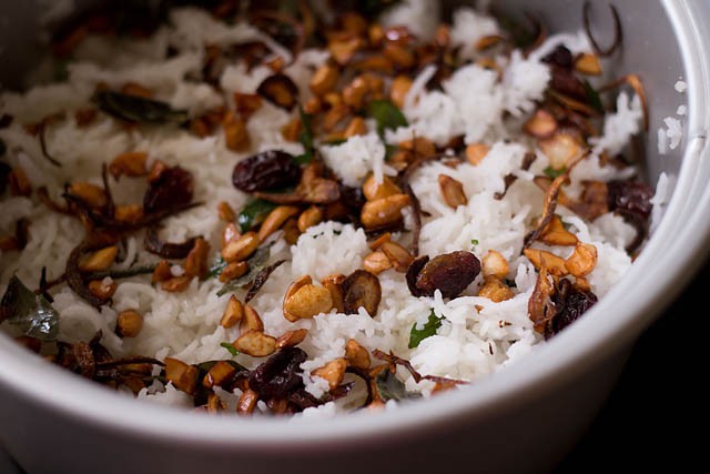 adding fried mixture to the cooked rice 