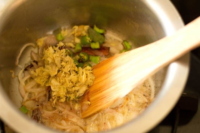 frying ginger-garlic paste and green chilies for kerala biryani 