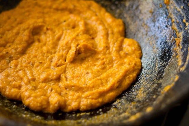 cooking masala paste till it starts to leave oil.